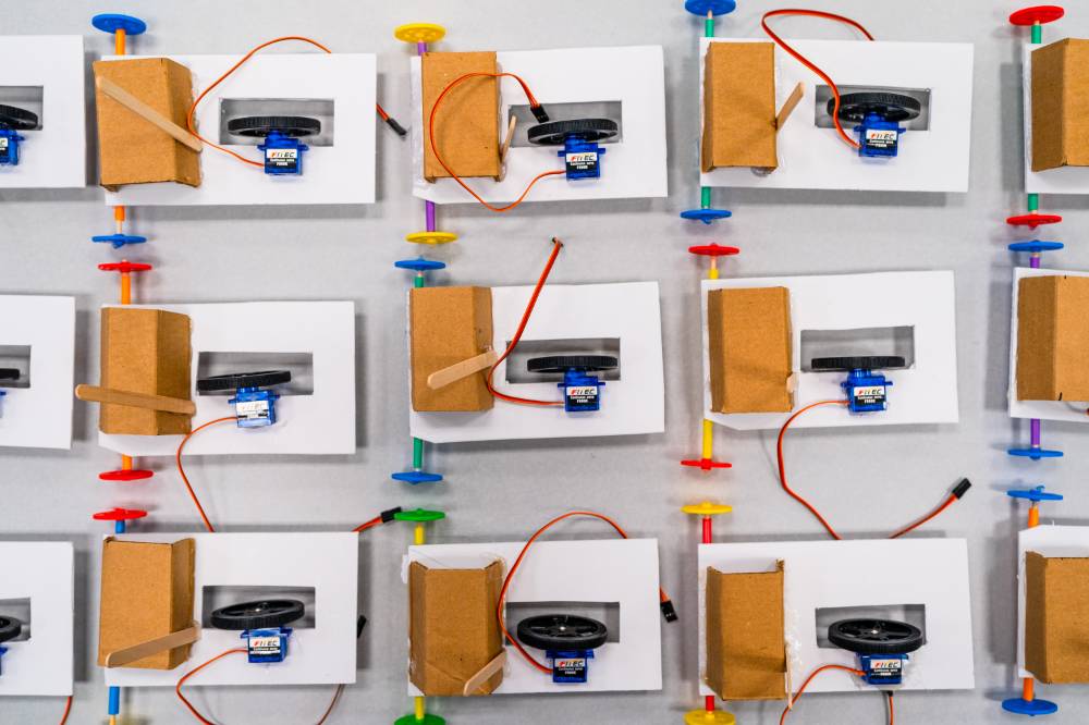 Robot cars assembled by students.